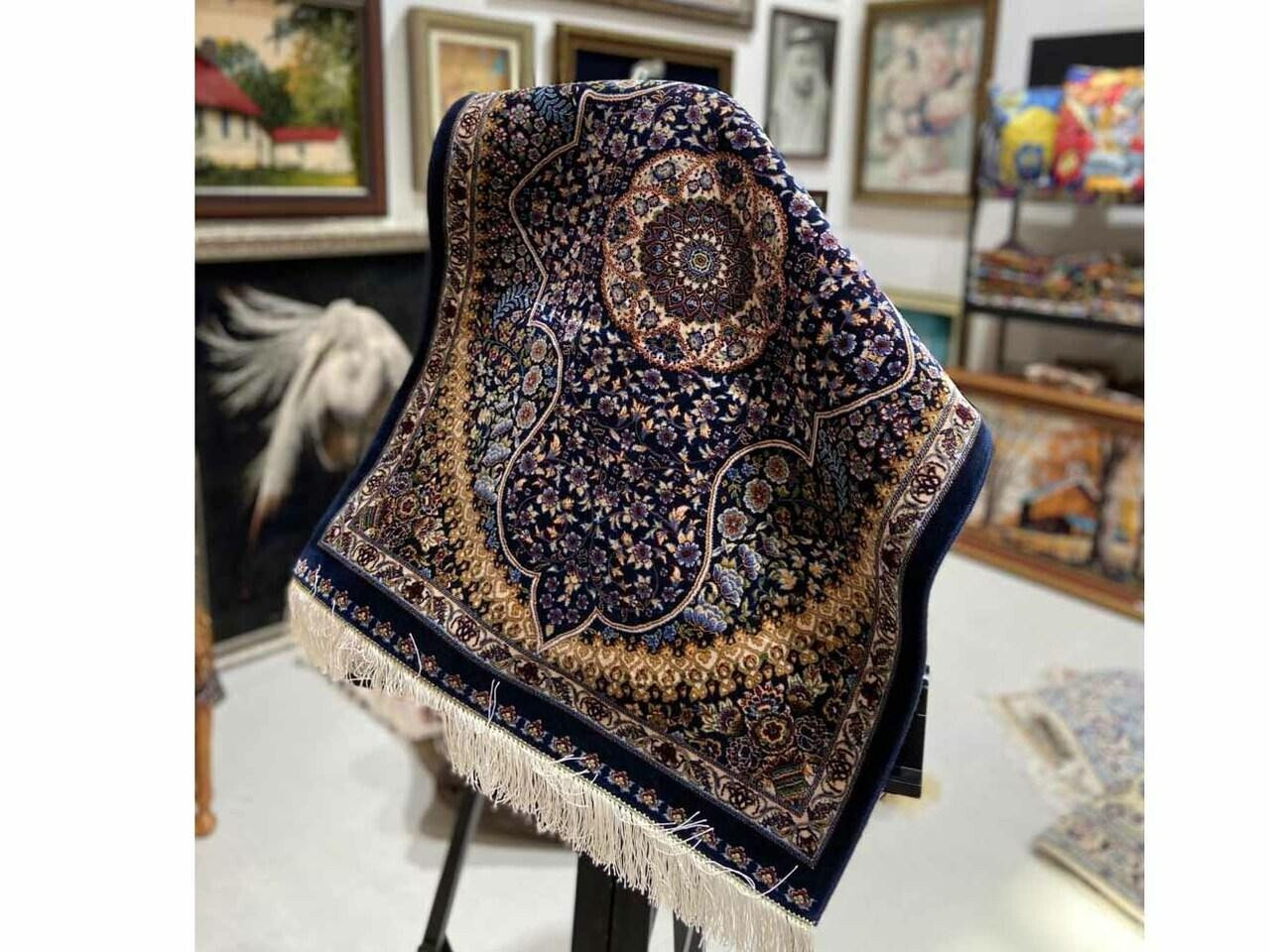 Detail of genuine fringe foundation on a handmade silk rug Detail of genuine fringe foundation on a handmade silk rug