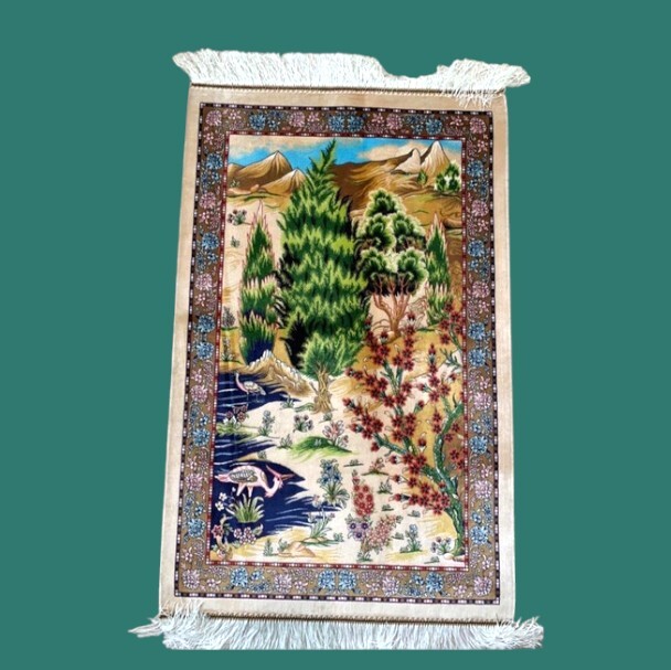 Close-up of hand-knotted back of a Persian silk carpet showing knot detail.